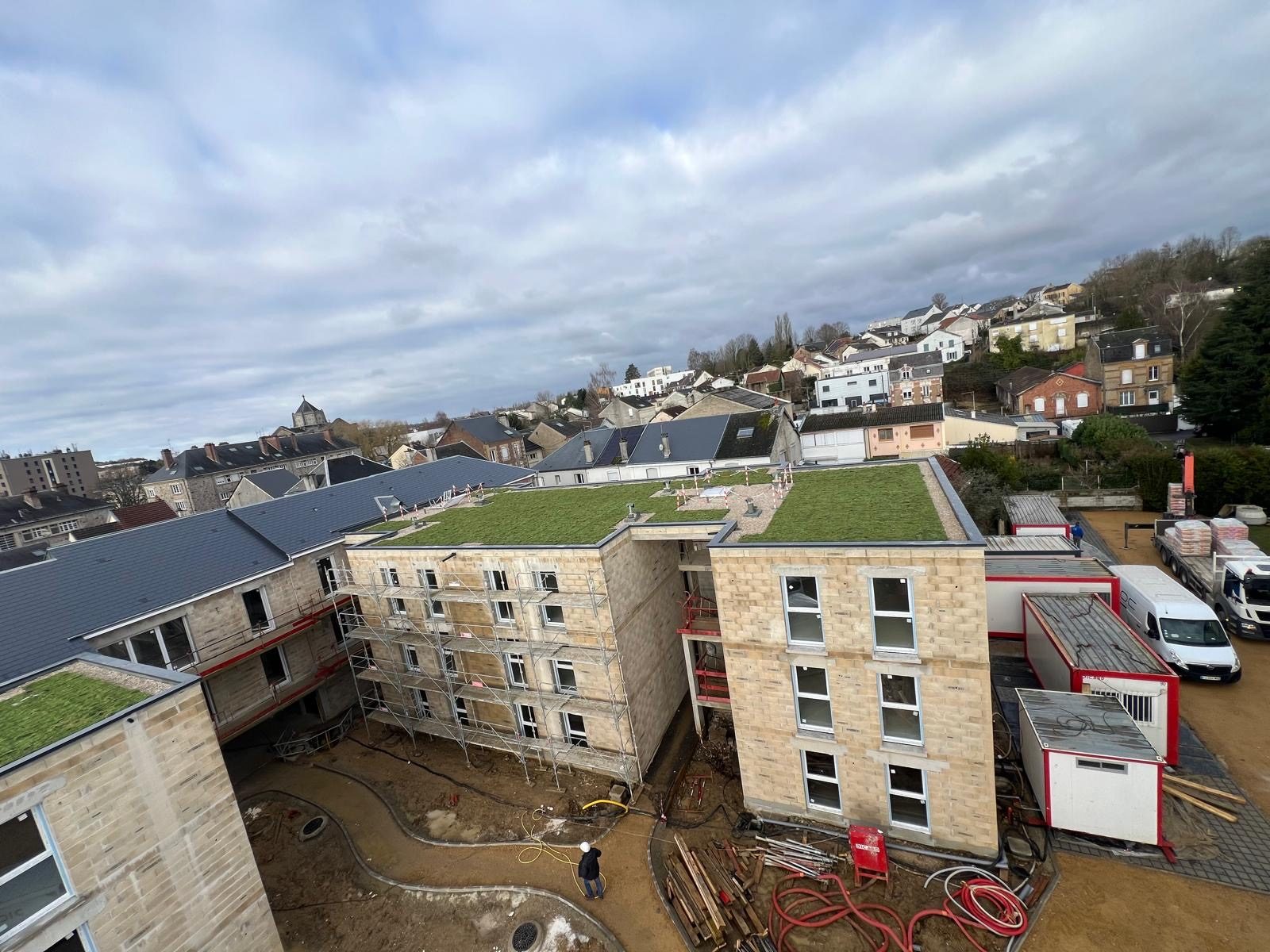 Programme résidentiel avec plusieurs toitures végétalisées